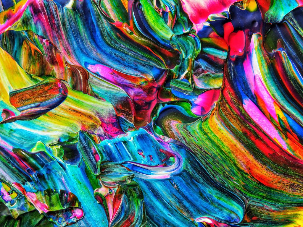 Colorful abstract design with vivid acrylic paint swirls creating a vibrant artistic pattern.